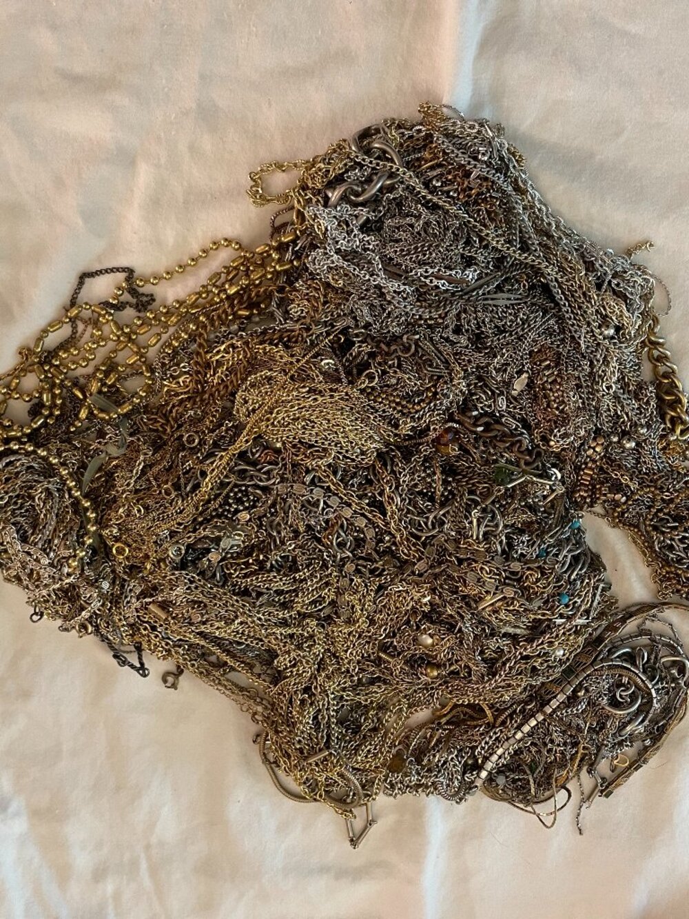Jewelry maker's pile, no whips, just chains.... gold tone & silver tone, tangled